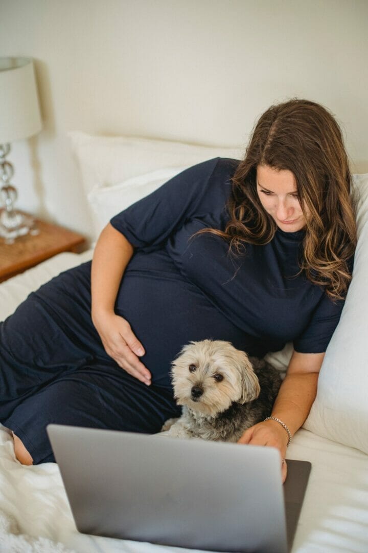 pregnant woman on laptop